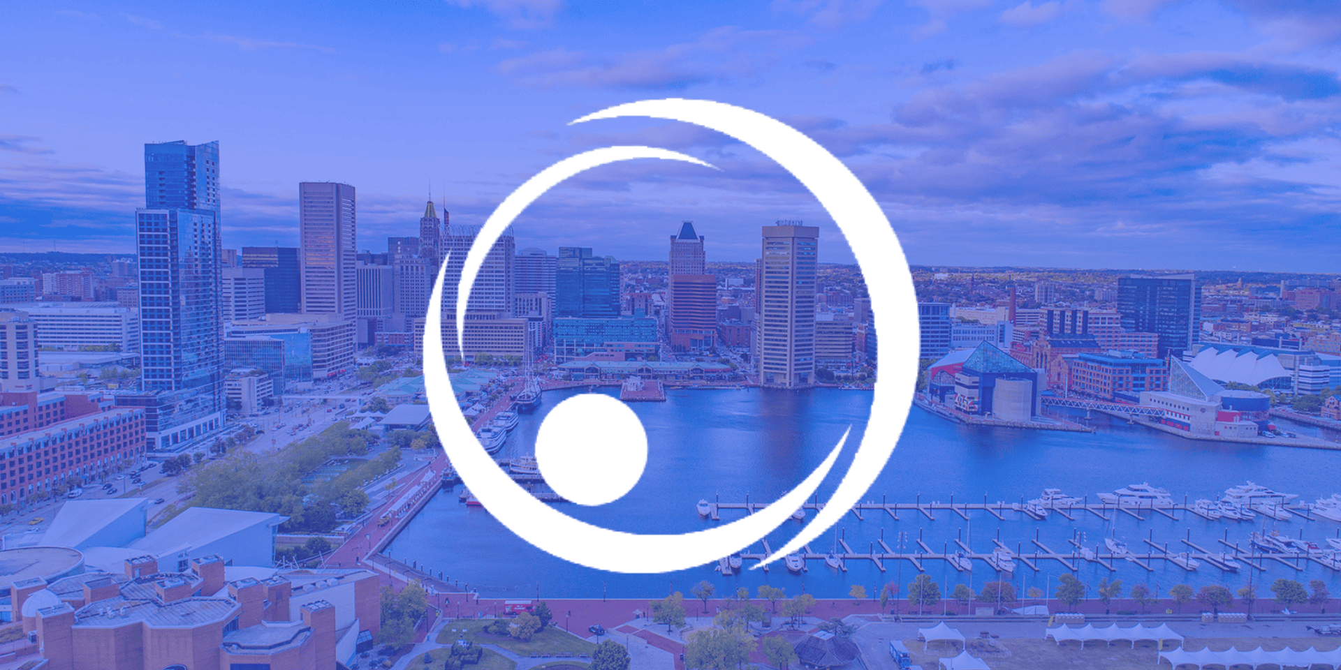 aap logo over baltimore background